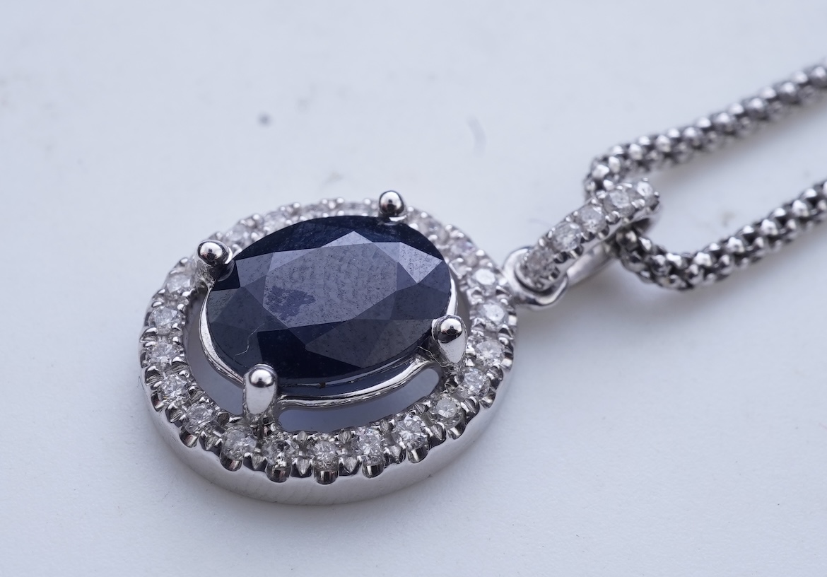 A sapphire and diamond demi-parure